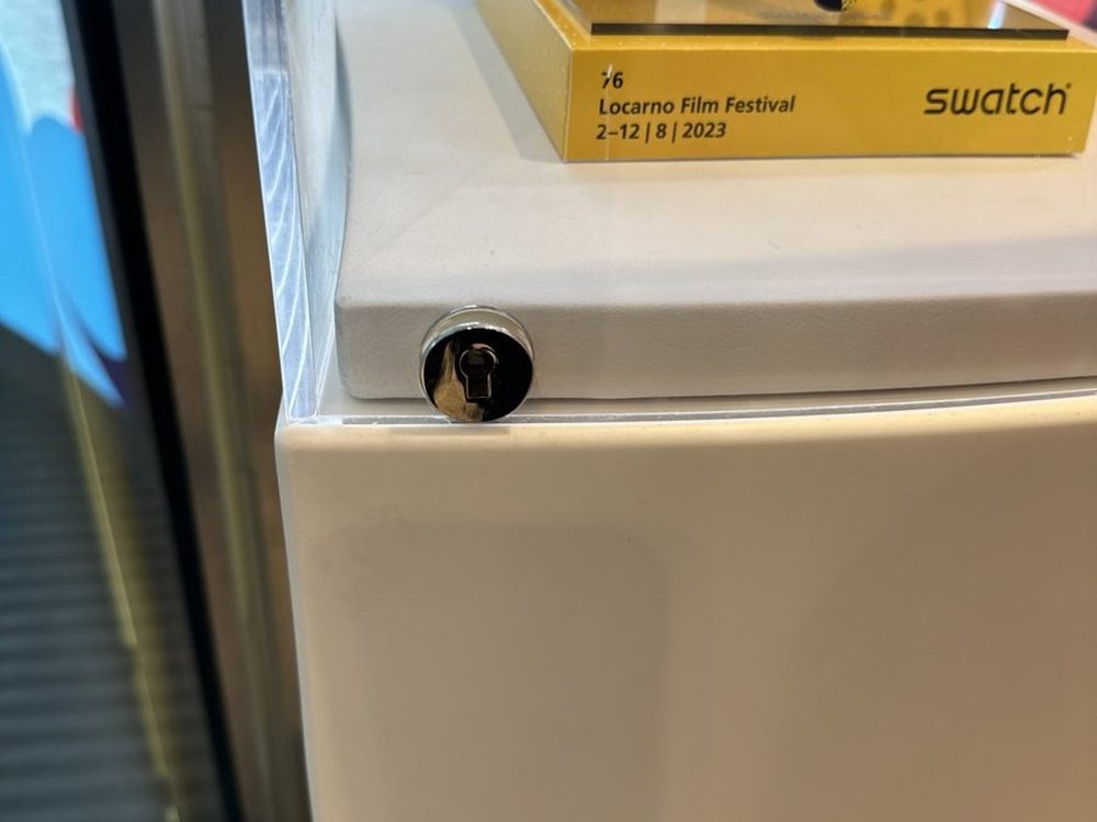 A display case lock being serviced inside a store on the Las Vegas Strip