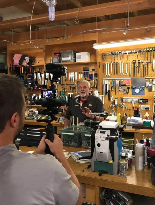 Filming a hardware store owner at the key machine