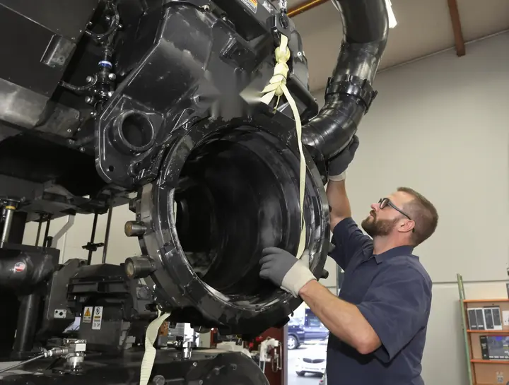 Lifting a DPF canister out of a semi exhaust system