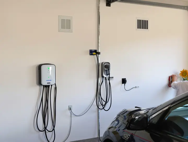 Level 2 EV charger mounted in a garage