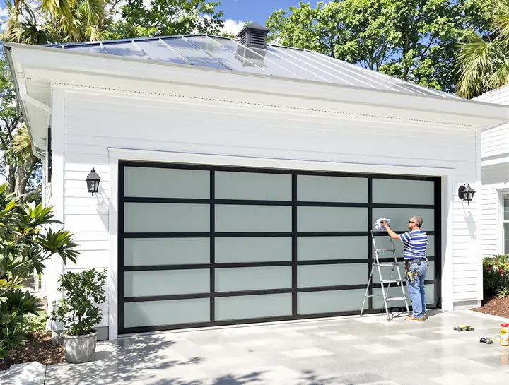 Black frame frosted glass door on a white board and batten home