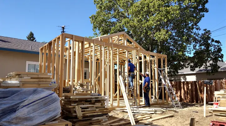 Framers building a backyard cottage
