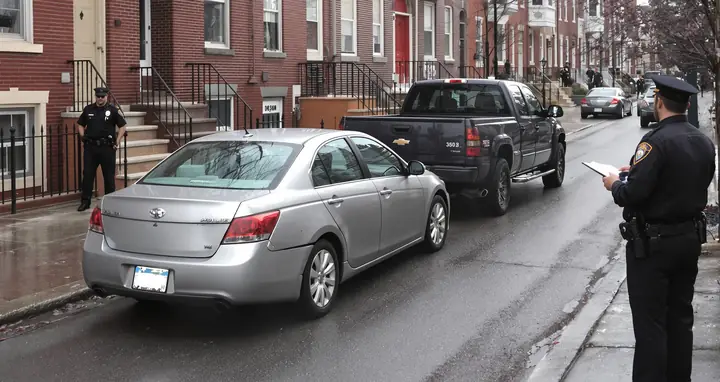 Police taking a report after a rear end crash in Fairmount