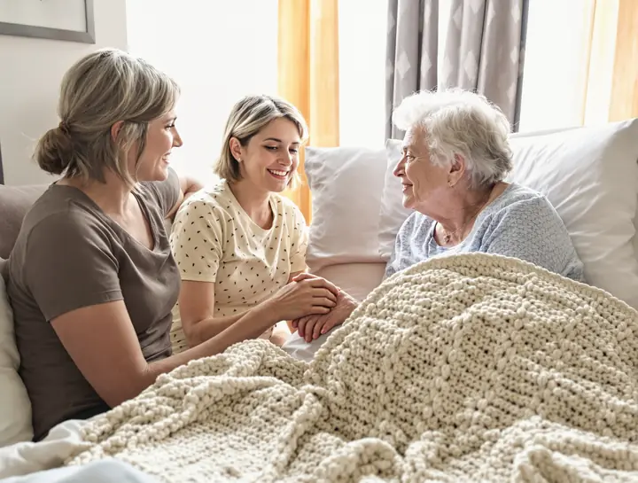 A family visit at a nursing home room