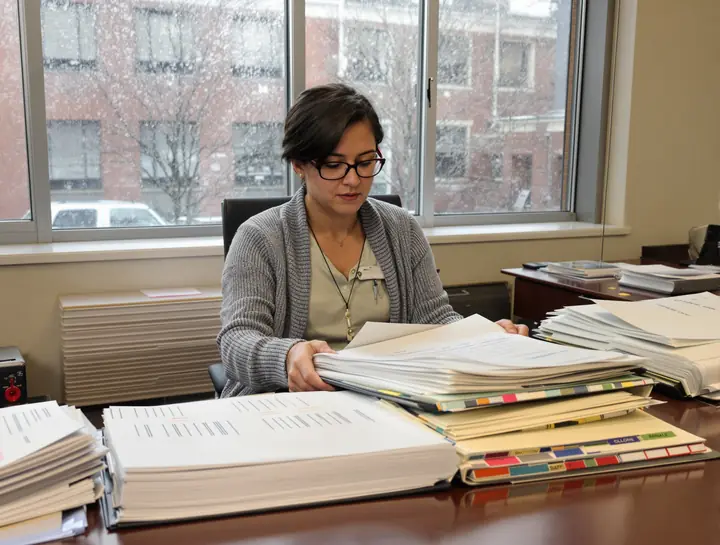 Our nurse consultant reading a client's full chart