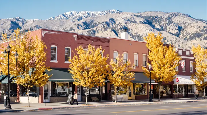 The shop door on a quiet brick street in downtown Carson City