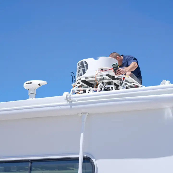 Testing the capacitor on a rooftop AC unit
