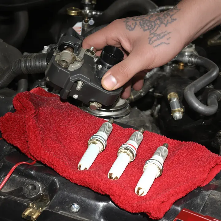 Worn spark plugs and an ignition coil