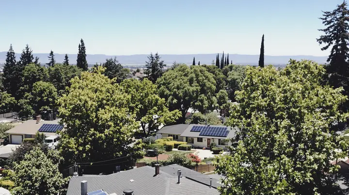 Sacramento neighborhood with solar panels on several roofs