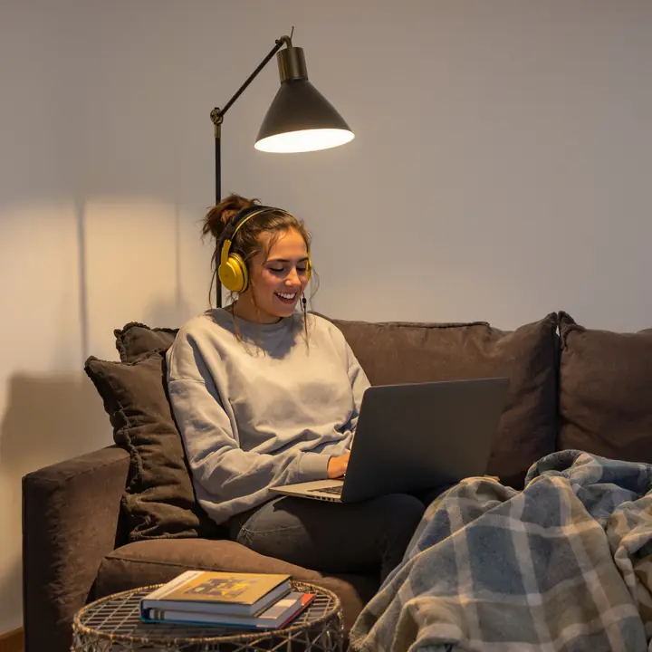 Woman on an evening video session from her couch