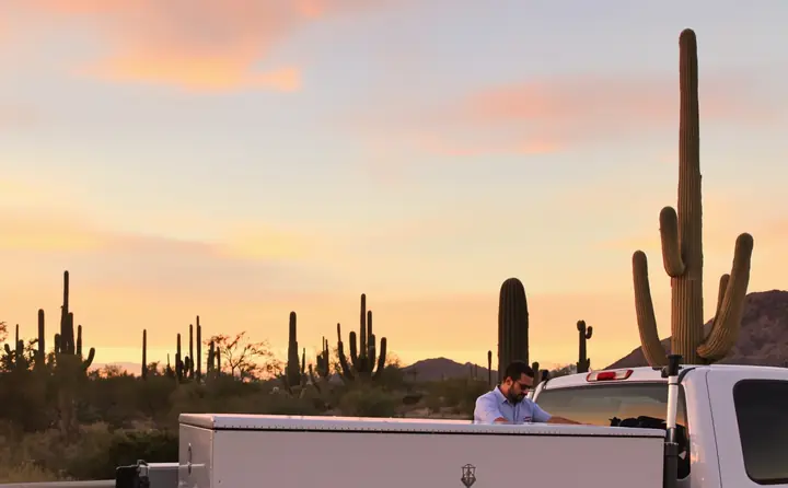 Service truck at a pullout at sunset